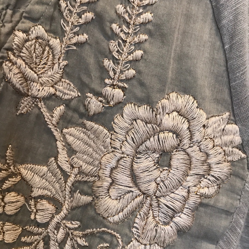 Embroidered button down.